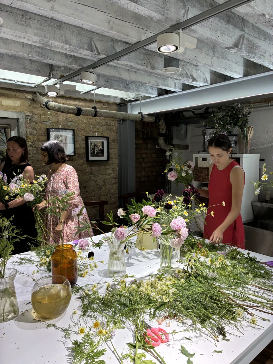 Guests making early summer bouquets